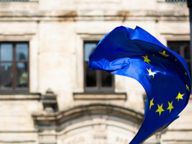 European Union flag in front of building